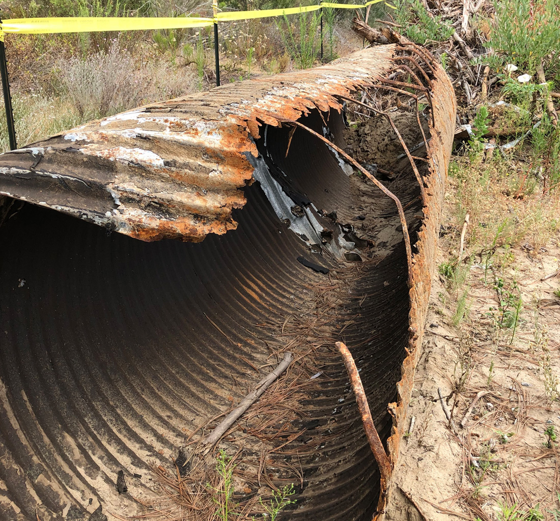 A damaged and rusty stormwater pipe