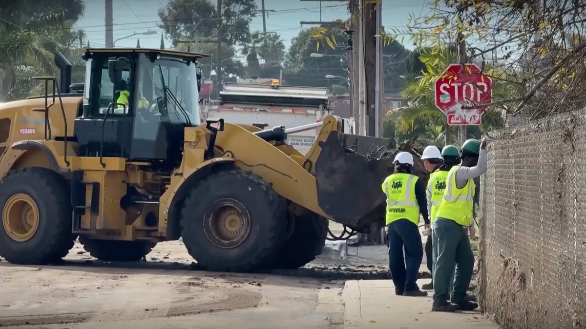 Construction workers working on a storm drain in San Diego